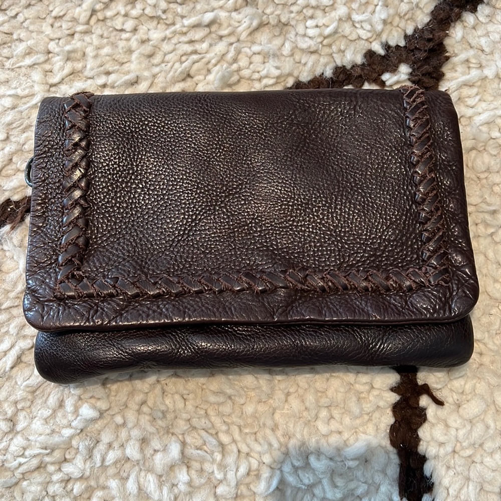 Leather clutch with built in wallet/card slips.
